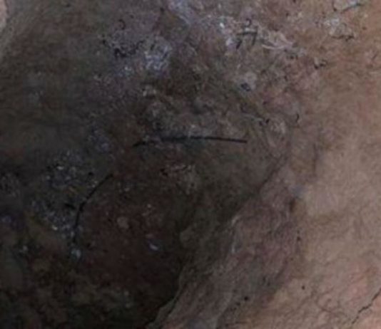 Investigan un agujero del que salió fuego en Arkansas